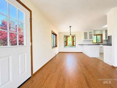 After &mdash; Dining and kitchen — flooring, paint and lighting